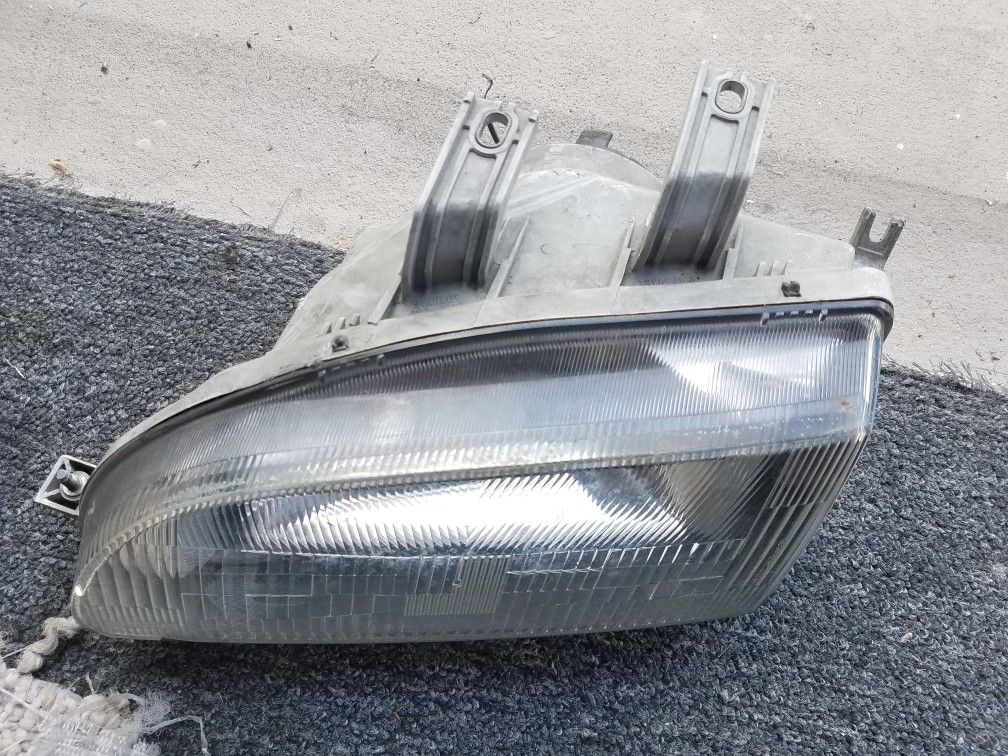 Jdm ferio civic headlight (No nipples) plastic only 1 Driver. Side