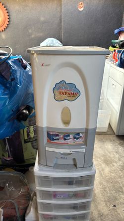 NEW RICE DISPENSER OR CAN BE USED FOR DOG OR CAT FOOD NEW $20