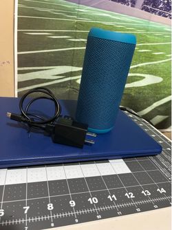 Ortizan X10 Portable Bluetooth Speaker Featuring Blue Casing And A Matching Blue Lanyard...