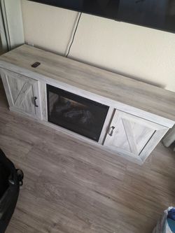 TV stand with electric fire place (heat)