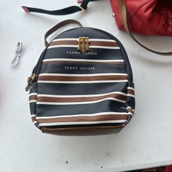 tommy hilfiger blue brown and white stripe backpack with front pocket