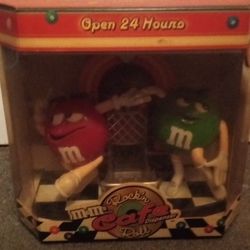 M&M Rock Roll Dispenser New $25.00