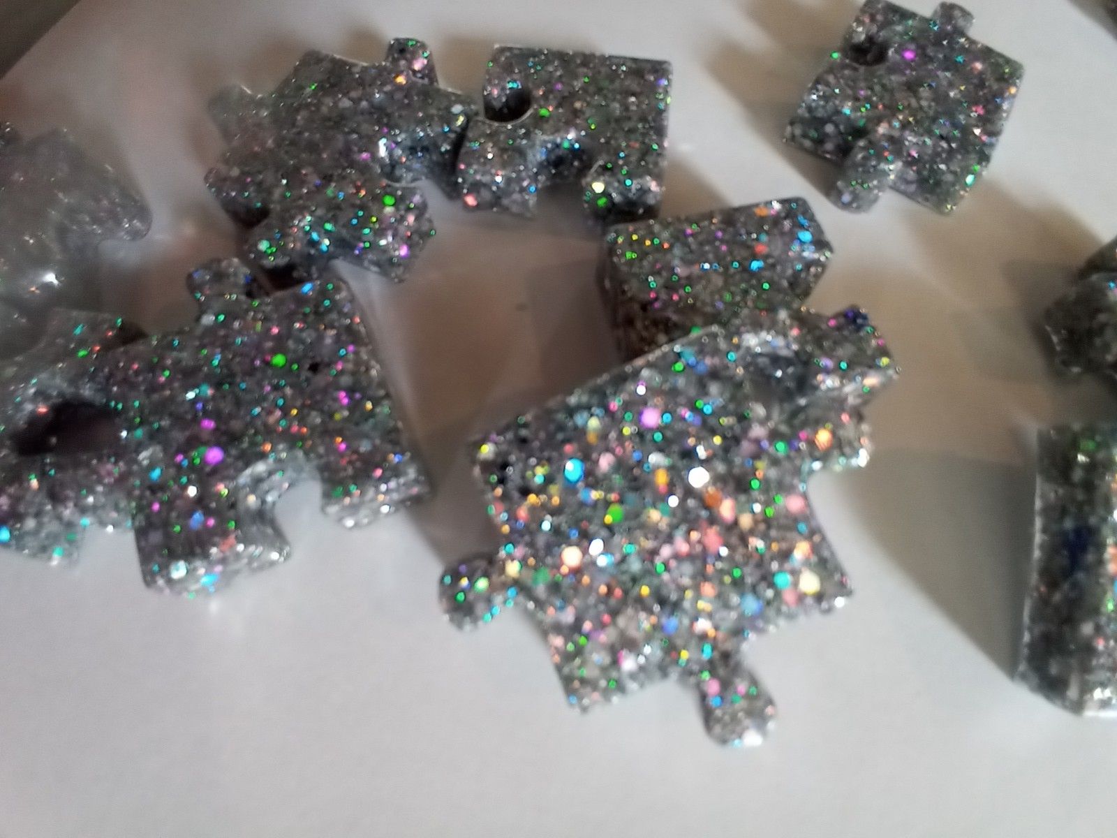 Silver puzzle shaped tiles