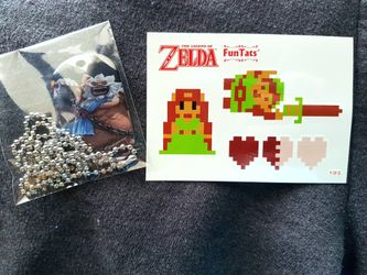 Daruk dog tag and Zelda tattoos