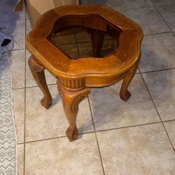carved wood and glass accent end table with cabriole legs