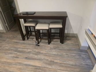 Side Table (59.5 inches Long x 20 inches Wide) 3 high chairs and 7 bar stools