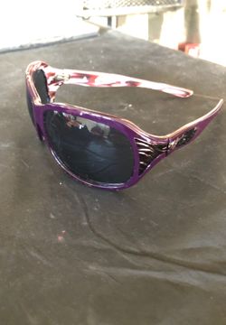 Oakley women’s plum color glasses