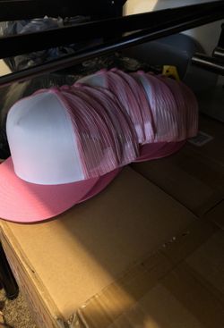 Pink and white hats