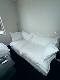 White starter couch and ottoman