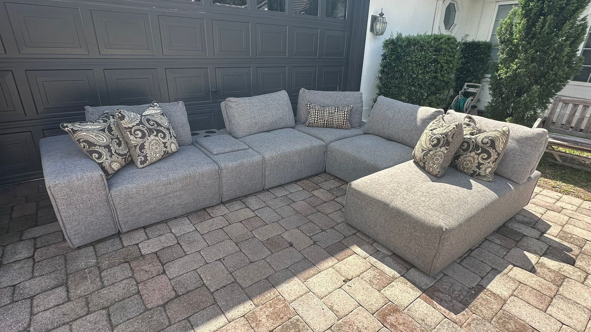 I would like to buy your Sectional/Modular Sofa Rooms to go Laney Park Beige/Gray 6 Pieces (1 is Speaker) DELIVERY AVAILABLE