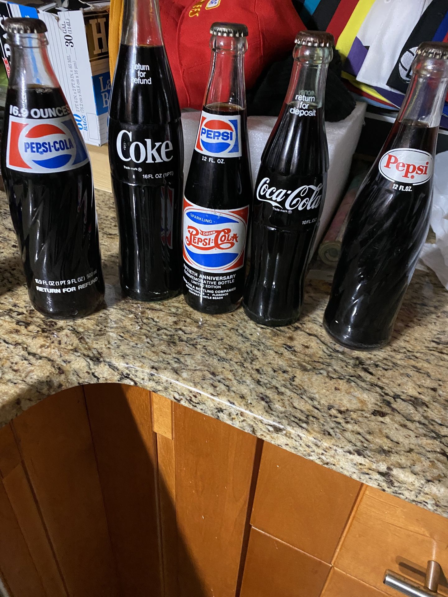 Vintage Pepsi and Coca-Cola Bottles with Soda Still In It