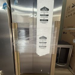 Two door Frigidaire, stainless steel, ice and water refrigerator