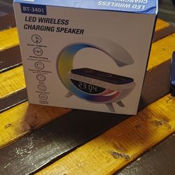 LED Wireless Charger, Clock And Radio With Bluetooth...(Brand New)