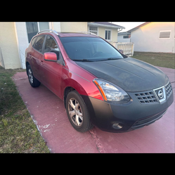NIssan rogue 2009 clean title cold ac 4cil $2000