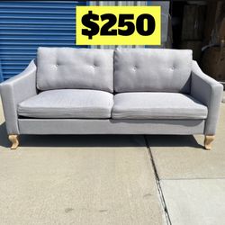 Brand new. Mid century modern Sofa. Light grey. 