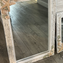 Two nautical mirrors . 30 by 20 inches