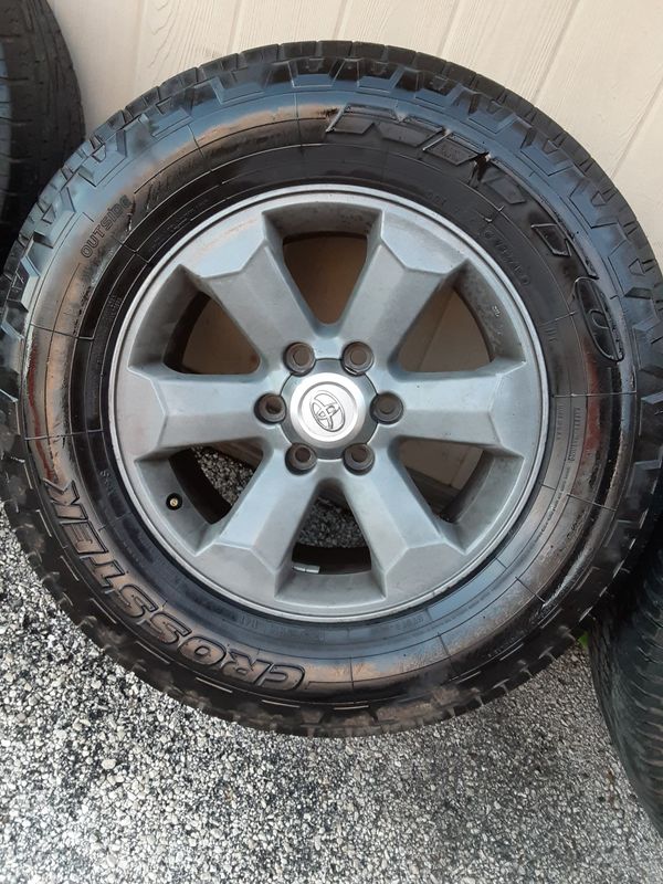(4) 18" 6 lug Toyota truck rims and tires for Sale in Kissimmee, FL