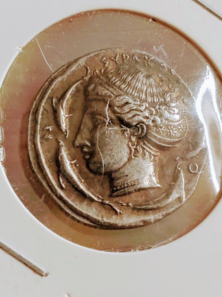 **RARE NOVELTY** 1026
Sicily,Syracuse,Tetradrachm, c. 415-405BC
17.2g.Obverse: ΣΥΡΑΚΟΣΙΟΝ Arethusa left with hair in sphendone, four dolphins around.