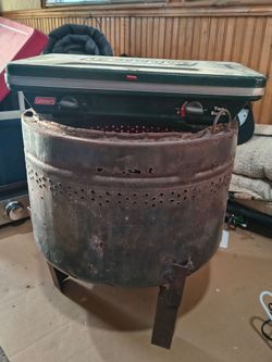 Washer drum fire pit with legs and a camp stove