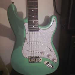 Electric Guitar With Amplifier And Accessories. 