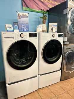 LG 4.5 Cu.Ft. Washer and 7.4 Cu.Ft. Front load Gas Dryer with Pedestal Storage Drawers