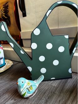 Wood cut out watering can
