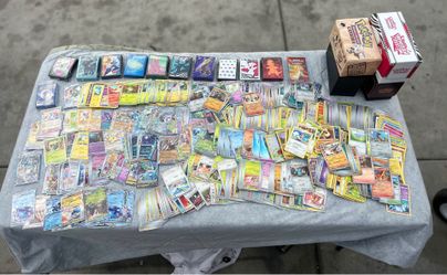 Over 1,000 Pokemon cards lot + over 500 sleeves