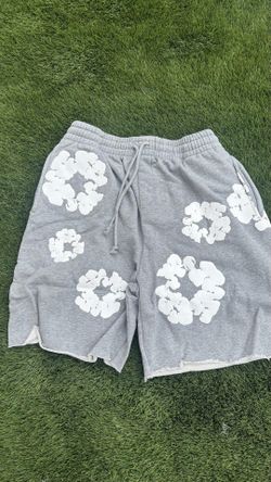 Grey and white denim tear shorts