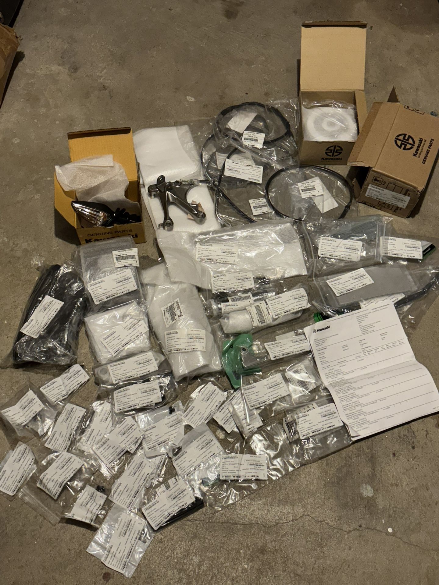 LOT of OEM KAWASAKI PARTS BRAND NEW WITH INVENTORY LIST AND STAMPS ON EVERY PART