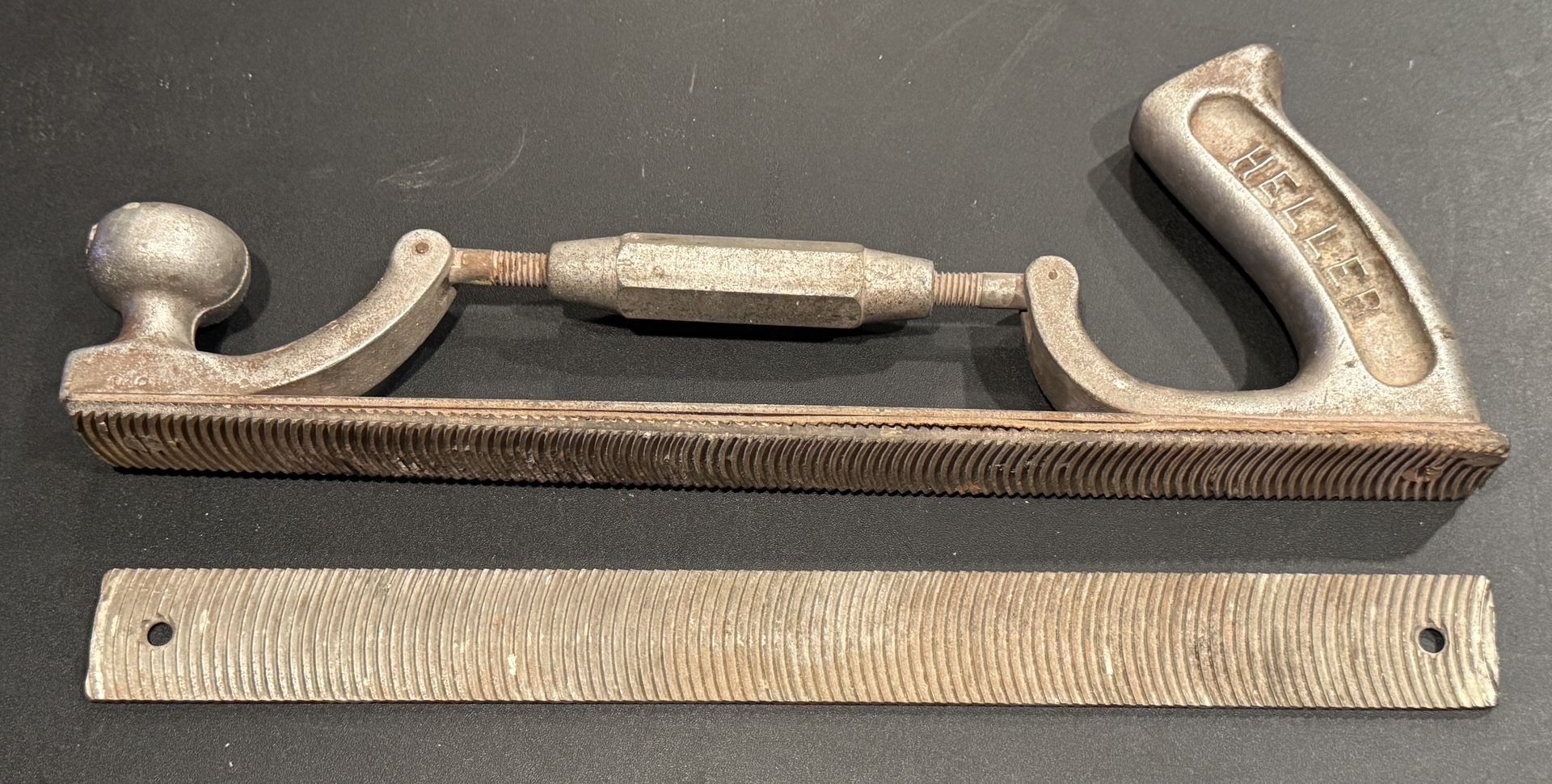 Vintage Heller Bros. Ajustable Auto Body Rasp File 472 Tool. Approximately 14” length. Tool shows signs of use/age. Comes with extra rasp as shown in
