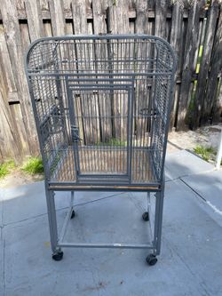 Bird Cage With Wood Tray (22”1/2W x 21”1/2D x 49”1/2H)Used but In Good Condition $90 Firm on Price