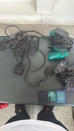 3 ps2 controllers with 3 memery cards
