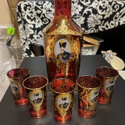 Elegant Red and Gold Decanter Set
