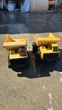 2 vintage metal tonka trucks