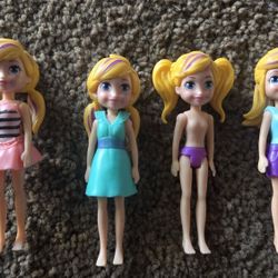 FOUR POLLY POCKET DOLLS 