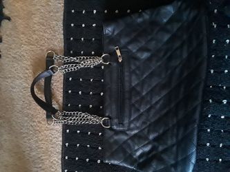 Black. Nice chain handle purse.