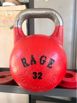 Rage Fitness cast-iron red kettlebell with a weight rating of 32 kg