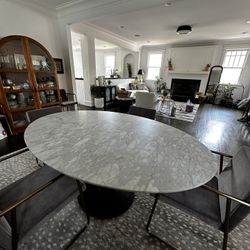 Williams and Sonoma Tulip Oval Pedestal Dining Table (70") Carrera marble top