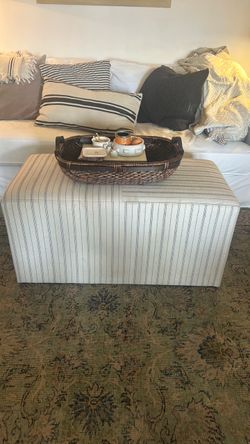Striped fabric ottoman