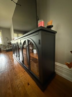 Black TV console/cabinet with Arch Glass Doors