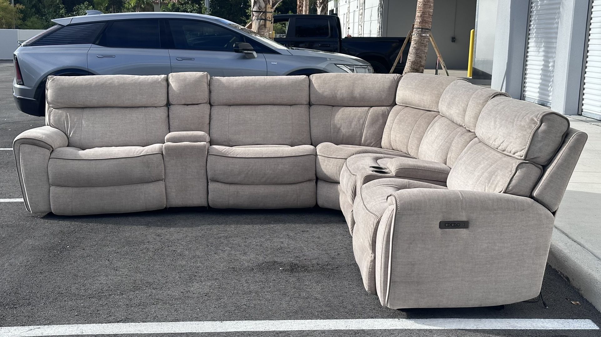 GRAY MODULAR SECTIONAL SOFA w 4 RECLINERS AND USB CHARGER by CITY FURNITURE - delivery is negotiable