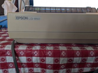 Epson LQ-850  dot matrix printer. Can print on continuous pin fed paper.