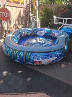 3D shark tank blowup pool- used