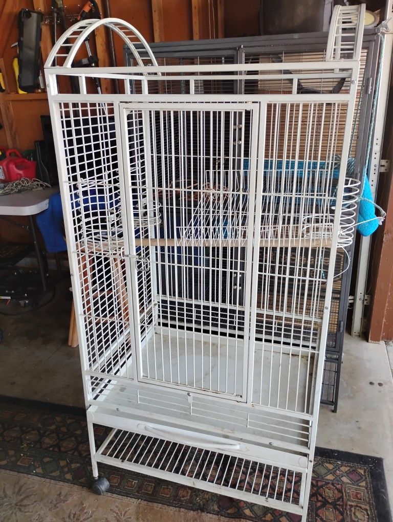 2 Bird Cages 100. 00 Firm Each