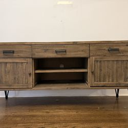 Distressed Brown Entertainment Center with Ample Storage