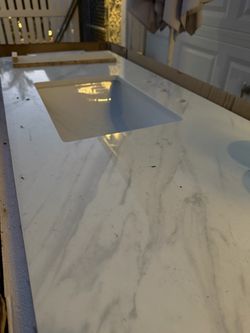 Bathroom vanity/sink with marble countertop