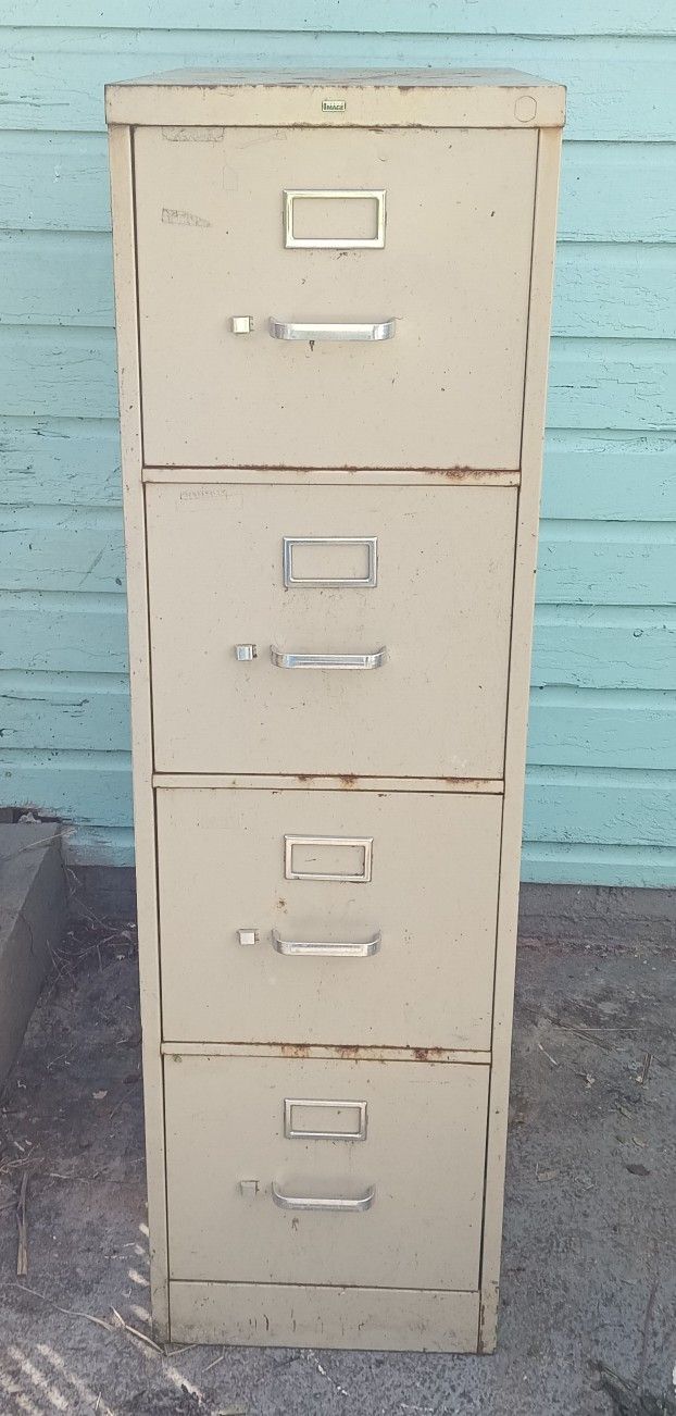 Old Metal Four Drawer File Cabinet
