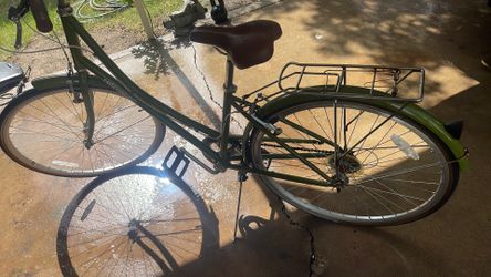 A woman bicycle