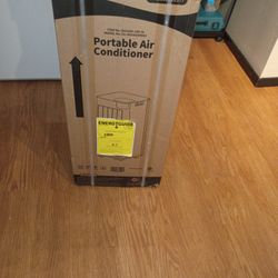 Portable Air conditionert New Factory Sealed.  4 In 1 
