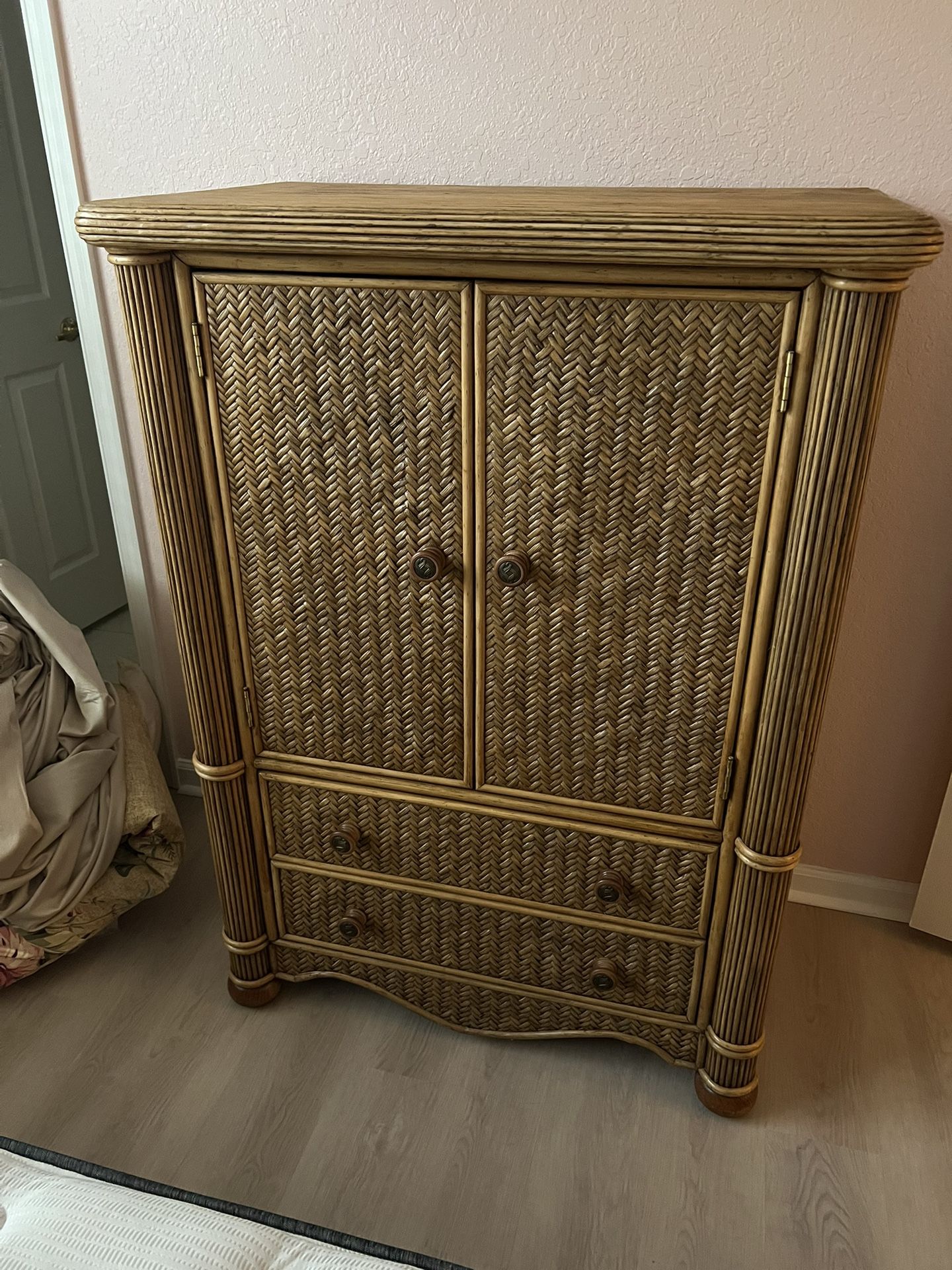 wicker cabinet with two doors and two drawers